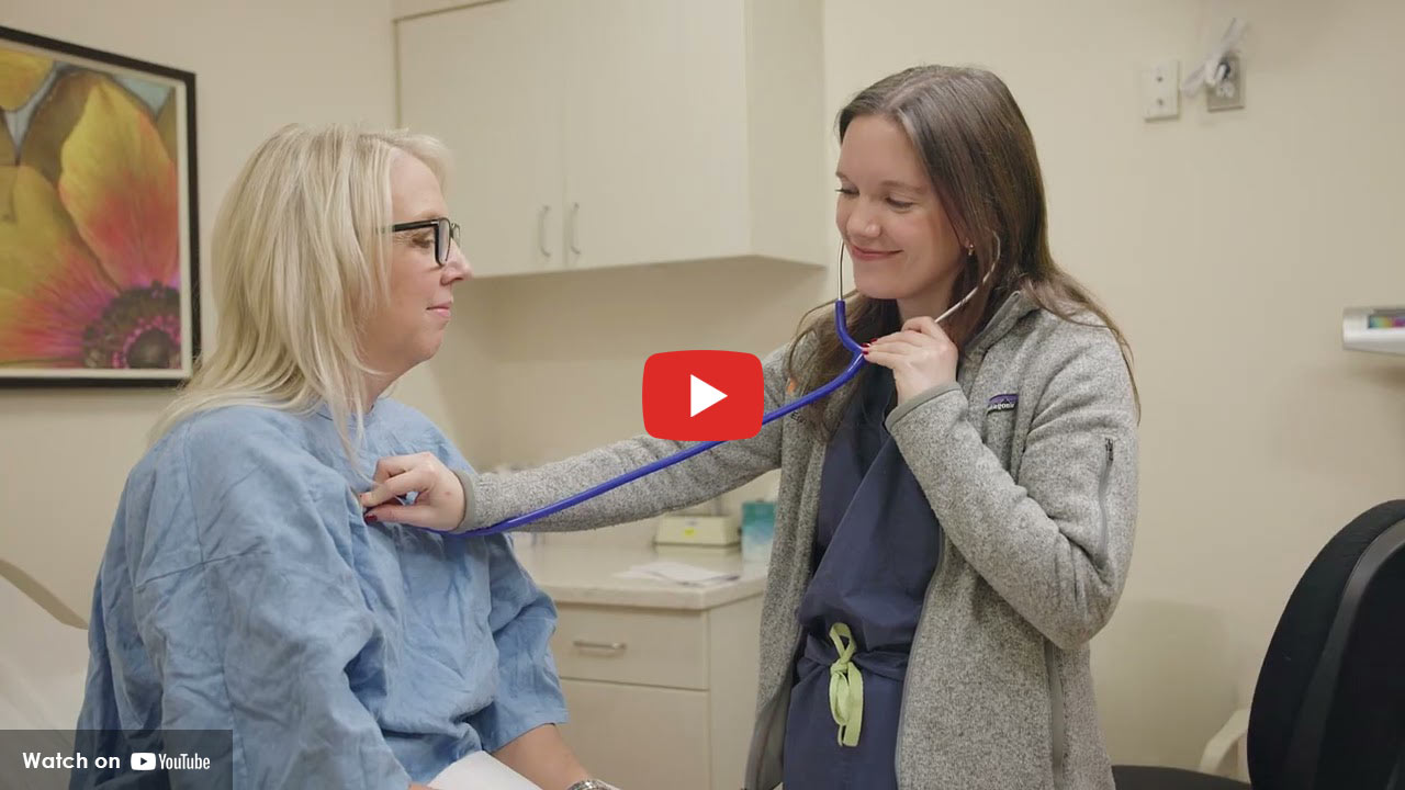 OB/GYN resident examining a patient