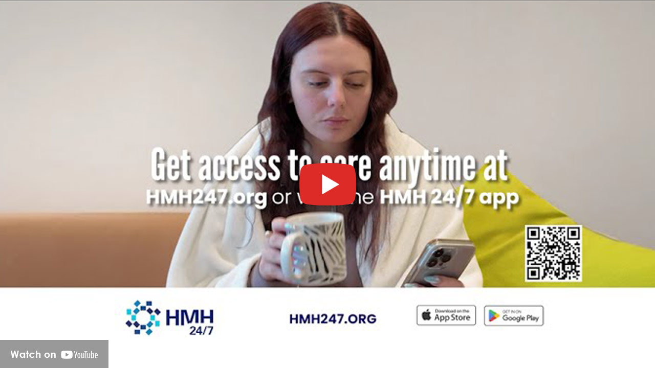 Woman using smartphone and coffee promoting HMH 24/7 app for virtual care access anytime