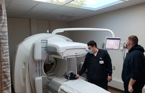 Photo of CT Scanner and Nuclear Medicine Techs
