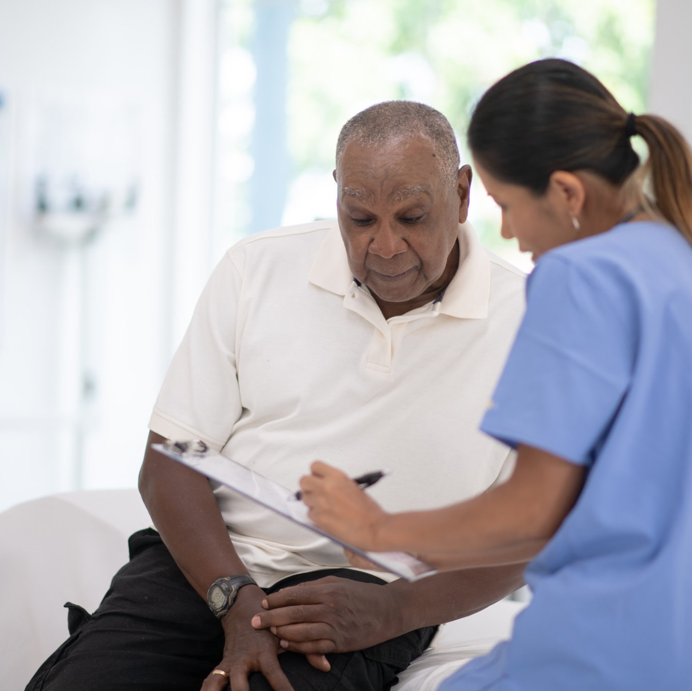 Male Cancer Patient Talking with Doctor