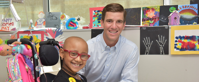 Eli Manning with Pediatric Patient