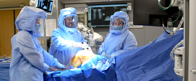 Orthopedic Doctors Performing Knee Surgery