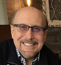 John Deputato of Wayne, New Jersey, smiles at the camera.