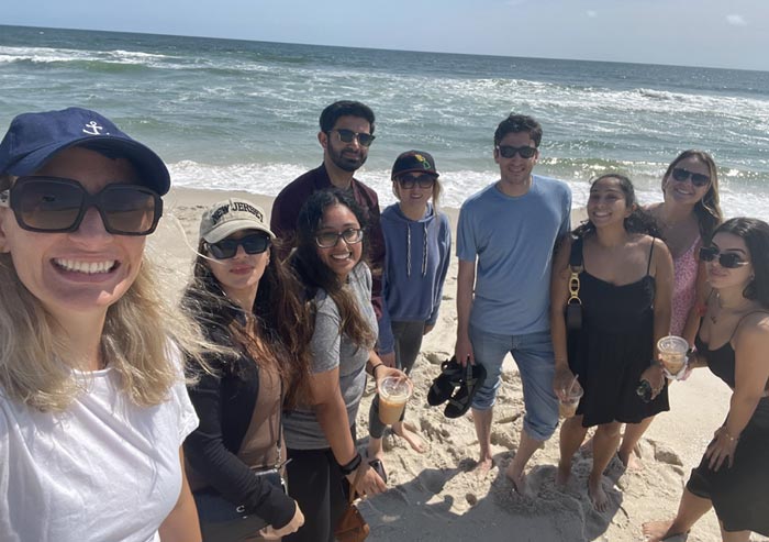 Group of people standing at the beach