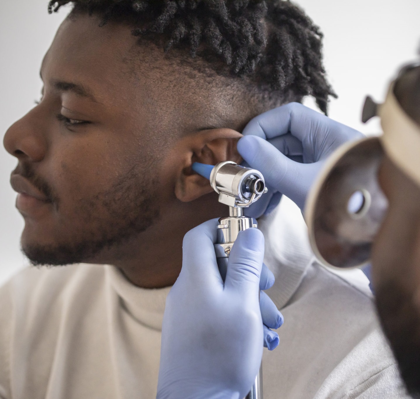 Why Do My Ears Feel Clogged? 4 Common Causes & Treatments