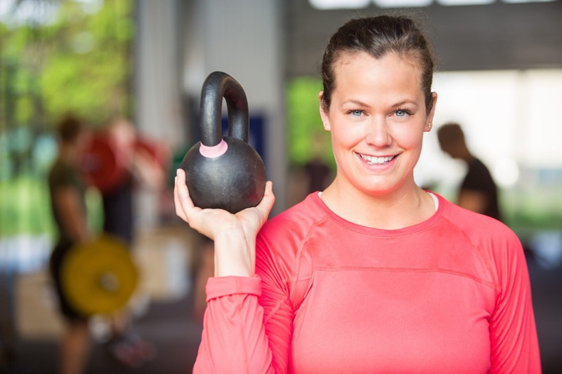 Woman holding kettlebell