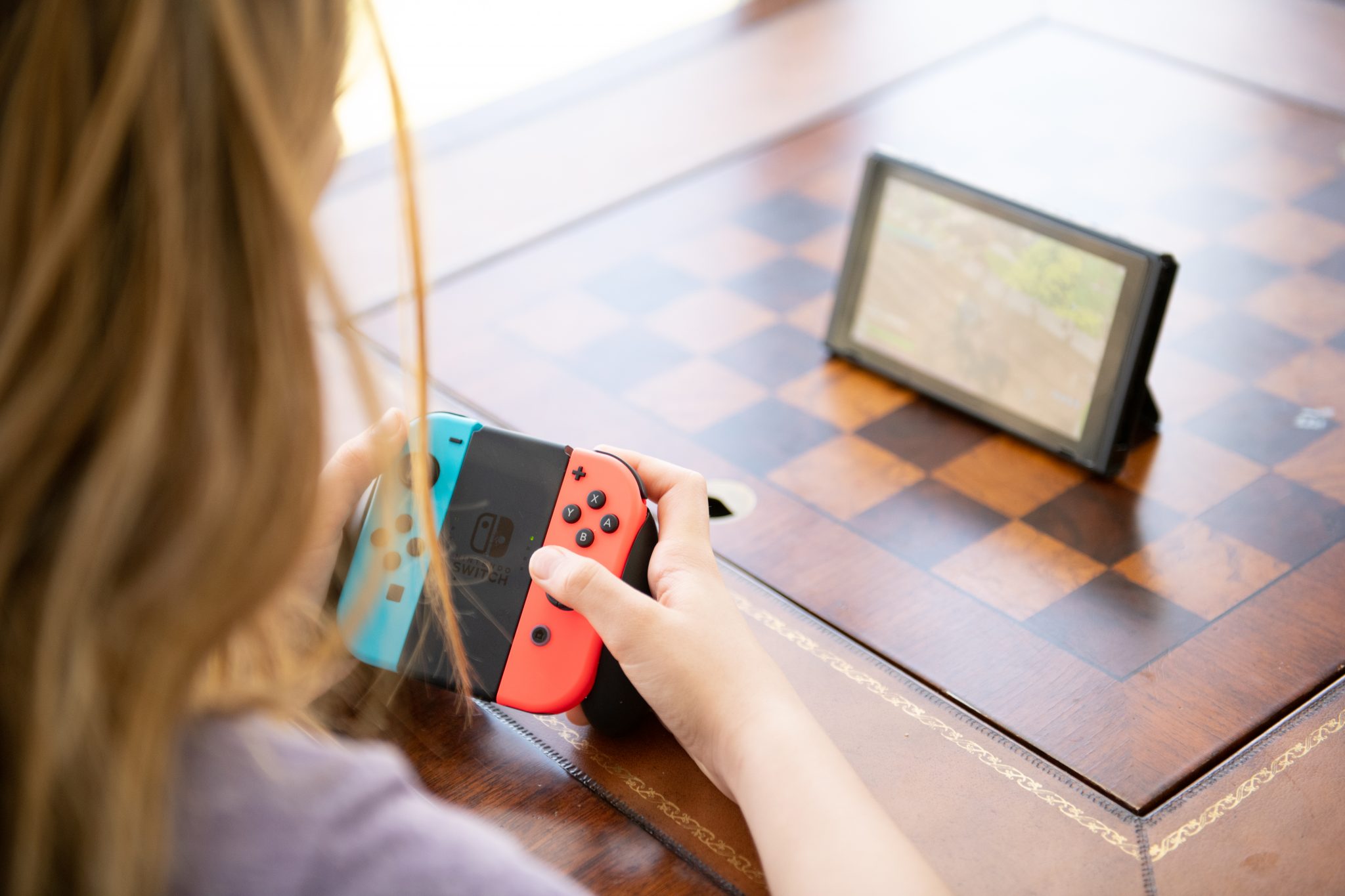 Person playing Nintendo Switch