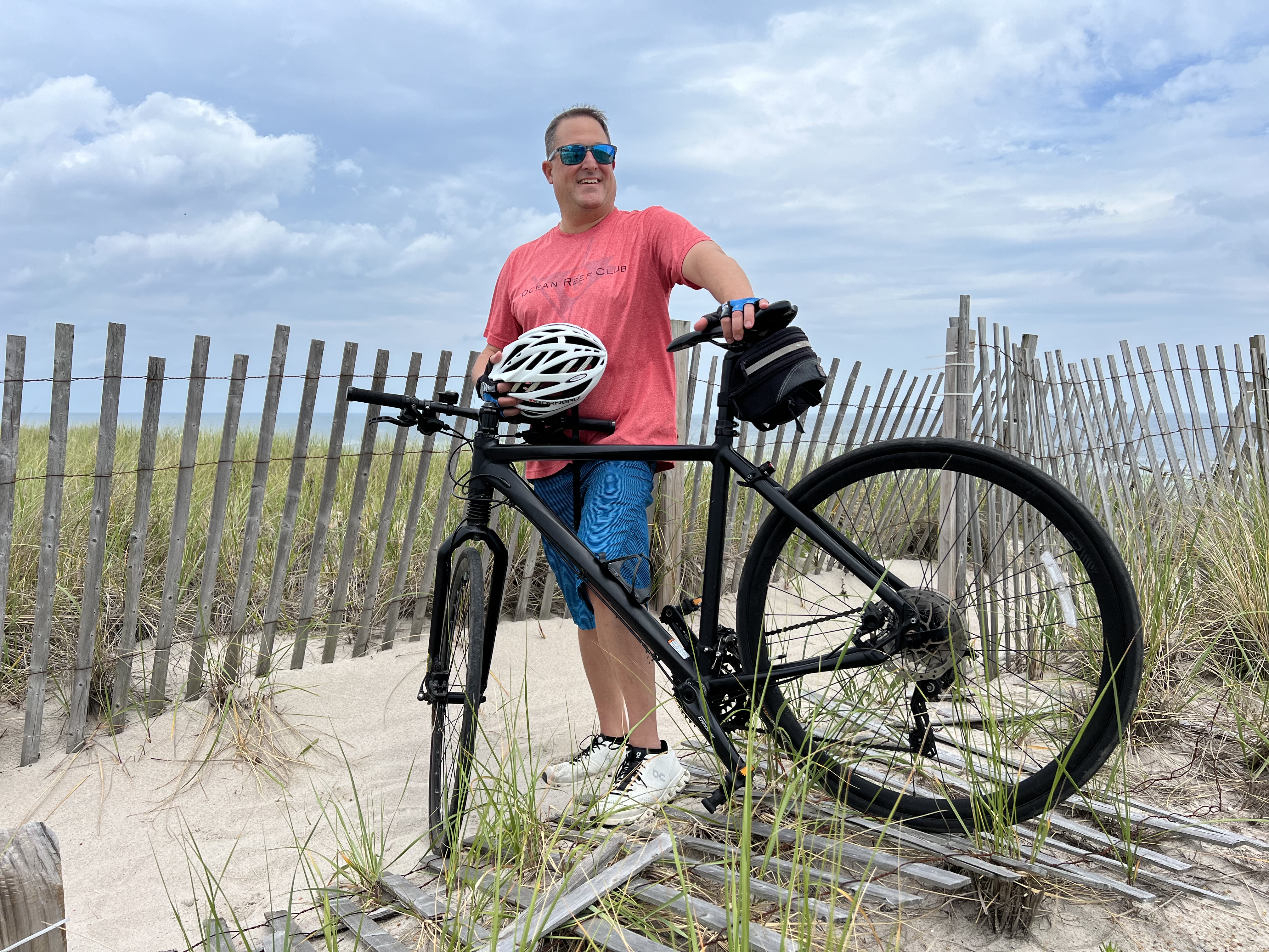 Anton Semprivivo with mountain bike on the beach