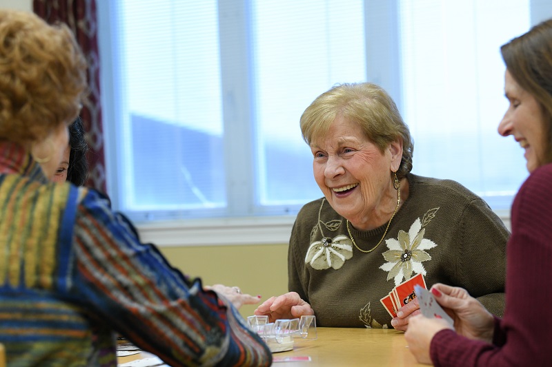 Joan Peck and friends playing cards