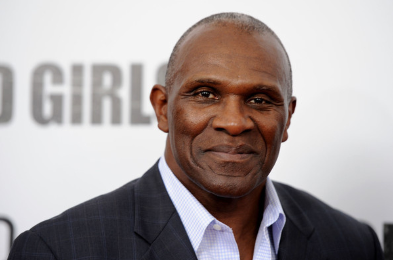 A close-up shot of Harry Carson looking at the camera with a closed-mouth smile.
