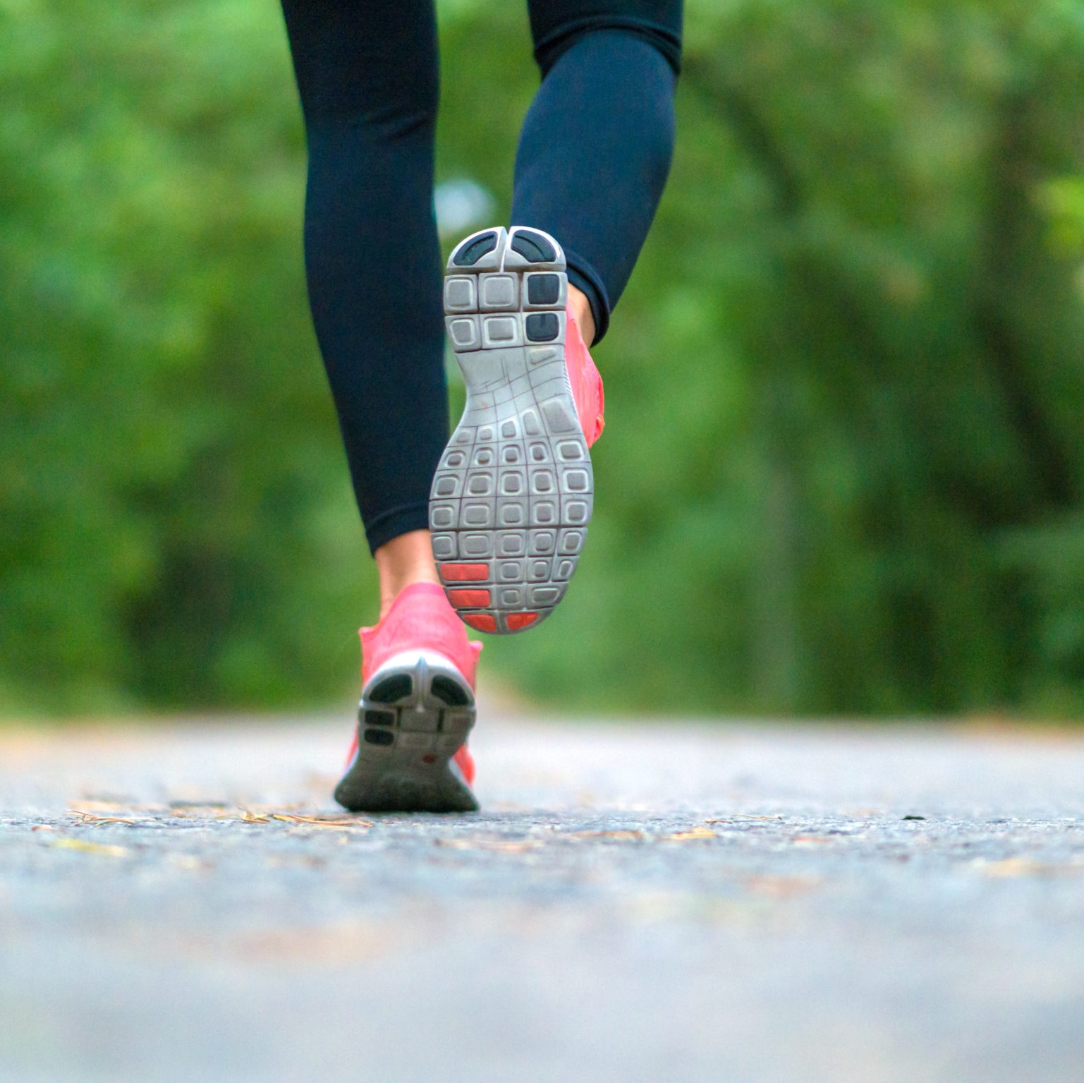 legs and feet of a person who is running