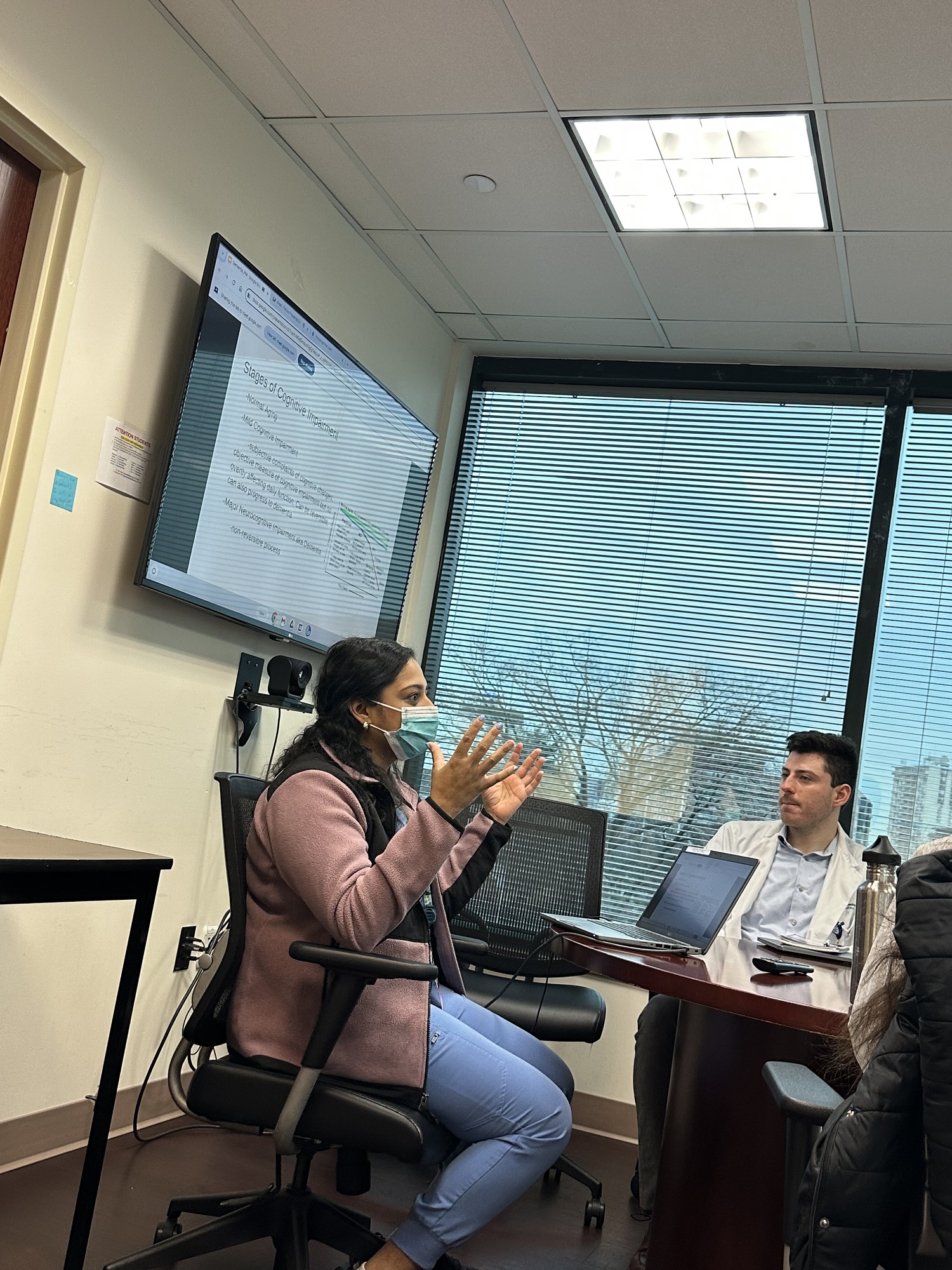 Pooja presenting to faculty trainees.