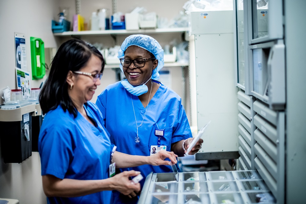 Two medical professionals smiling