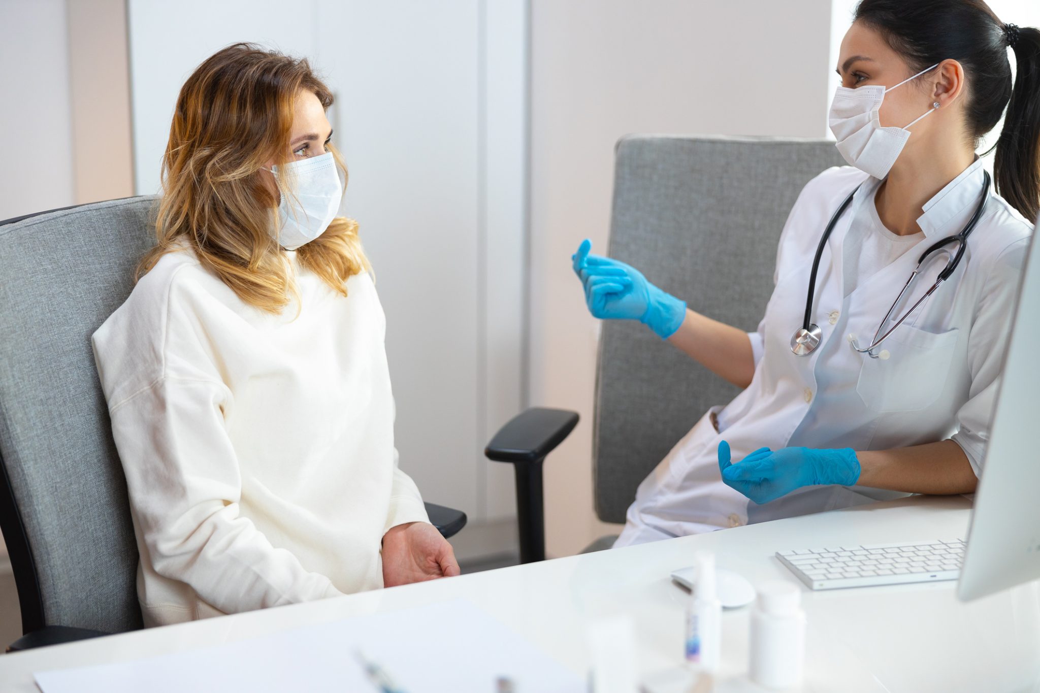 Female Patient Talking with Doctor