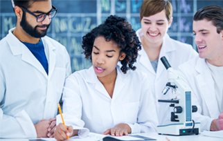 Group of young pharmacists looking over notes