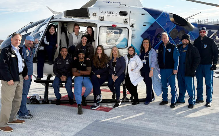 JSUMC Trauma Team in front of helicopter