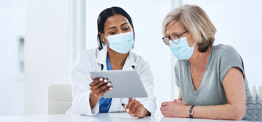 Doctor consulting with patient