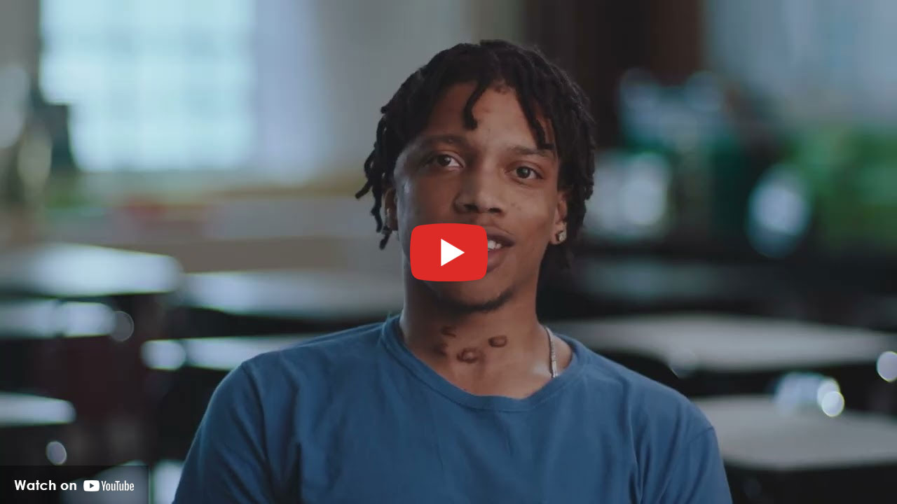 Young man looking toward the camera