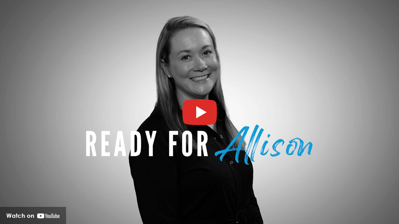 Smiling woman standing against a plain background with text reading “Ready for Allison”