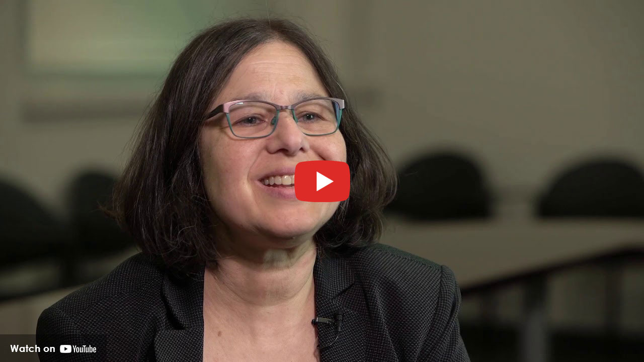 Woman speaking during on-camera interview