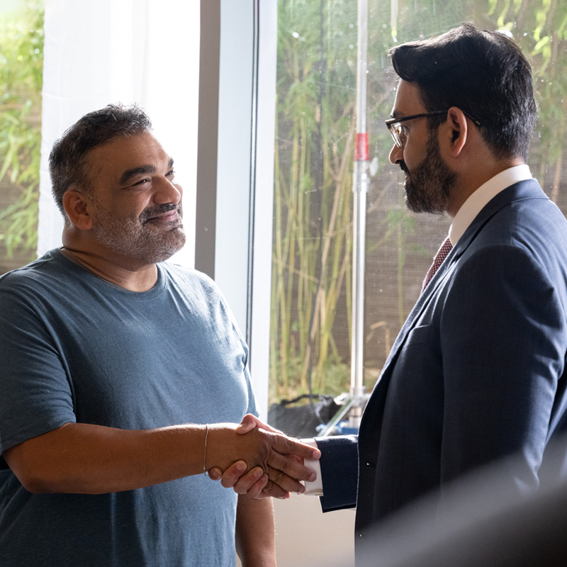 two men shaking hands